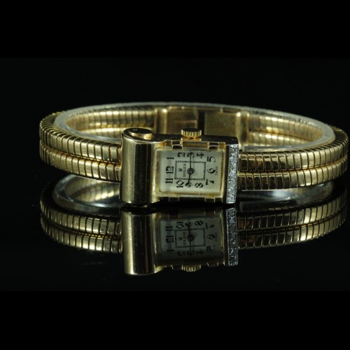 ROLEX Tank or rose années 40